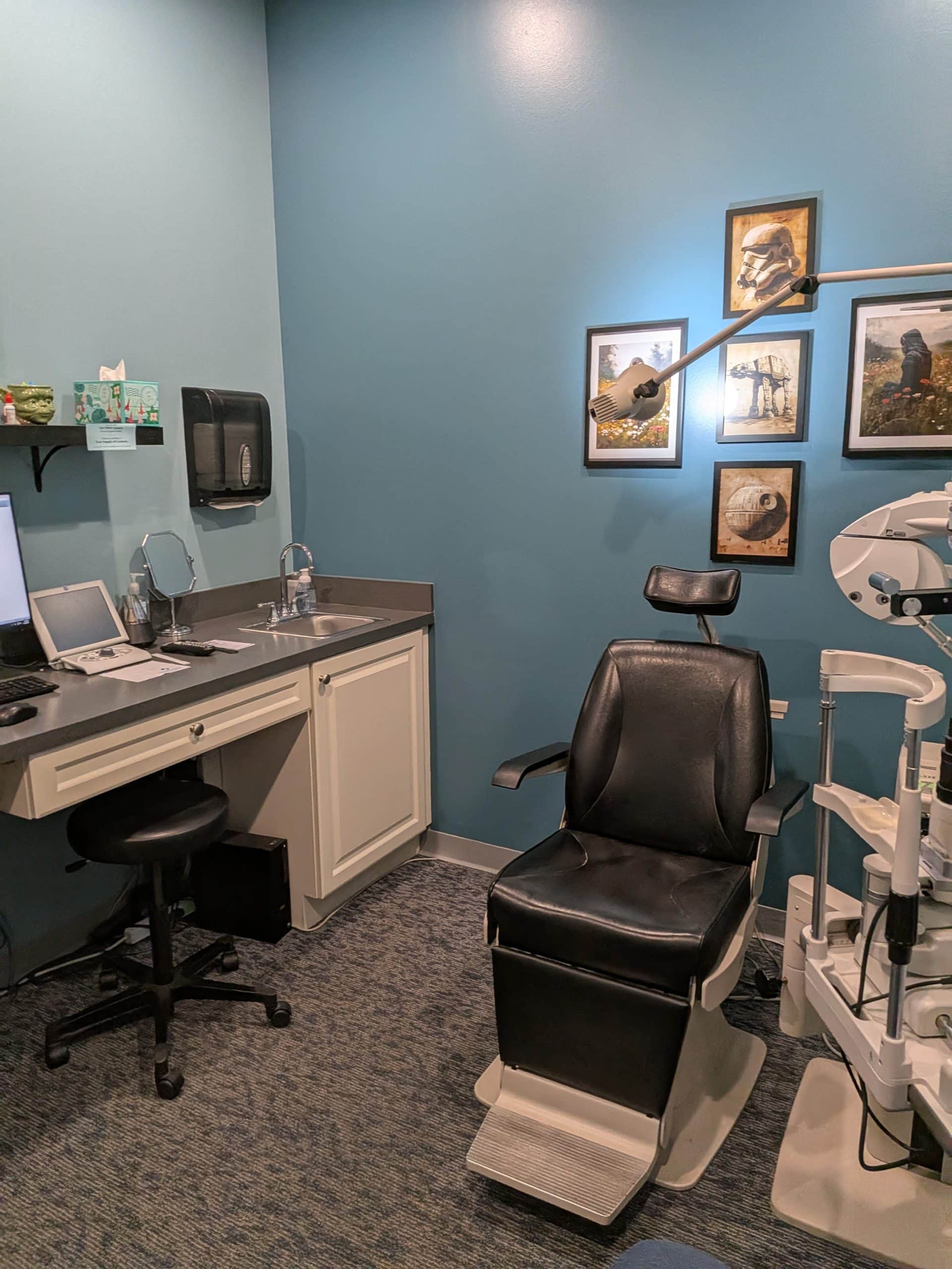 Exam lane at Central Ohio Vision and Eyecare in New Albany, Ohio, with a slit lamp and phoropter used during contact lens exams